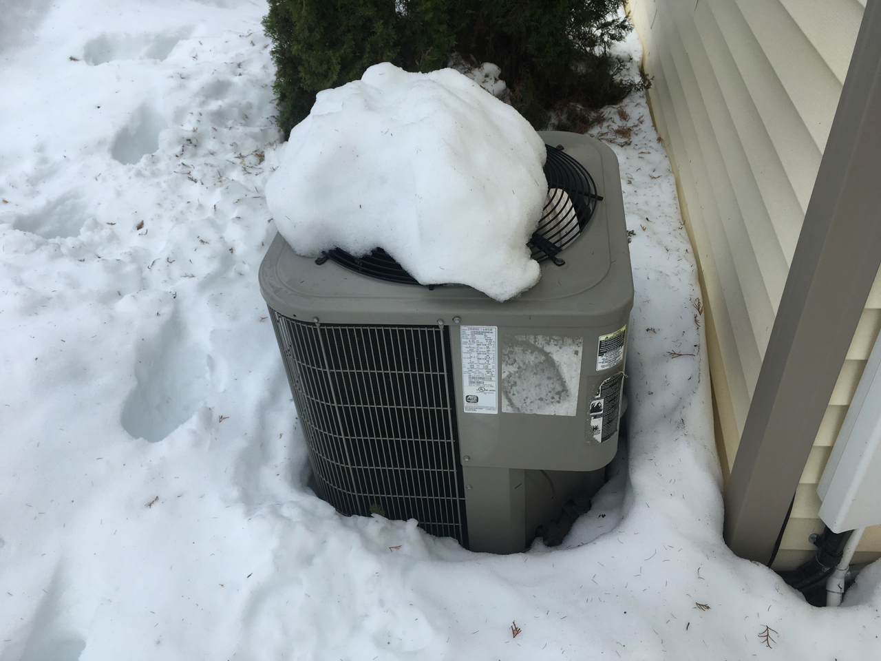 heat-pump-maintenance-in-snow-storms-wright-way-home-inspection